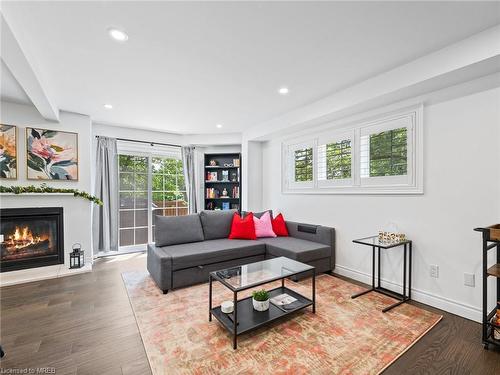 1 Harnesworth Crescent, Hamilton, ON - Indoor Photo Showing Living Room With Fireplace