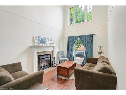 59-1100 Byron Baseline Road, London, ON - Indoor Photo Showing Living Room With Fireplace