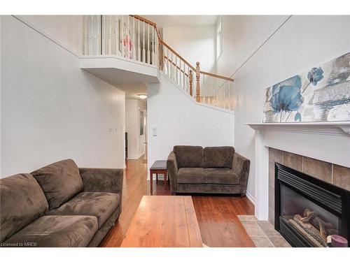 59-1100 Byron Baseline Road, London, ON - Indoor Photo Showing Living Room With Fireplace