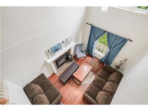 59-1100 Byron Baseline Road, London, ON - Indoor Photo Showing Living Room With Fireplace