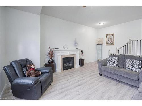 1860 Devos Drive, Middlesex Centre, ON - Indoor Photo Showing Living Room With Fireplace