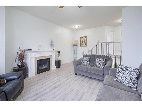 1860 Devos Drive, Middlesex Centre, ON - Indoor Photo Showing Living Room With Fireplace