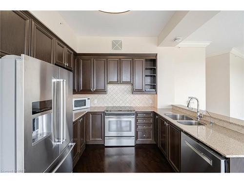 2004-1665 The College Way, Mississauga, ON - Indoor Photo Showing Kitchen With Stainless Steel Kitchen With Double Sink