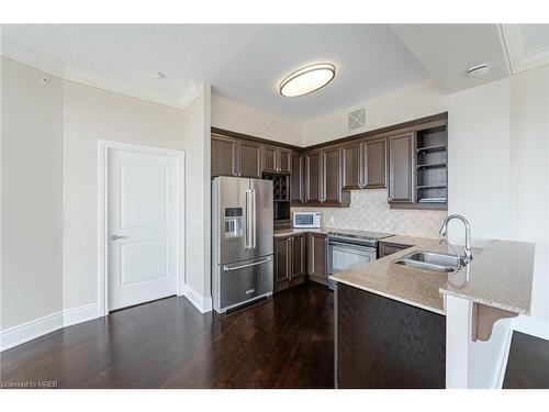 2004-1665 The College Way, Mississauga, ON - Indoor Photo Showing Kitchen With Stainless Steel Kitchen With Double Sink With Upgraded Kitchen