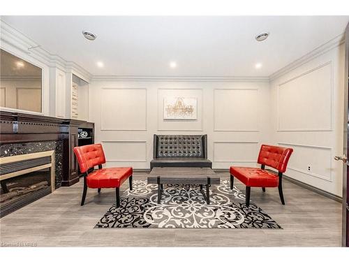 808-255 Keats Way, Waterloo, ON - Indoor Photo Showing Living Room With Fireplace