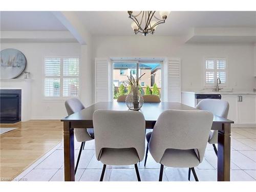 3343 Cline Street, Burlington, ON - Indoor Photo Showing Dining Room With Fireplace