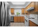 1215-100 Burloak Drive, Burlington, ON  - Indoor Photo Showing Kitchen With Double Sink 