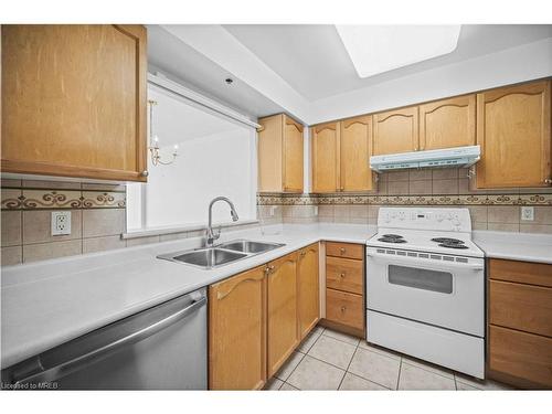 1215-100 Burloak Drive, Burlington, ON - Indoor Photo Showing Kitchen With Double Sink