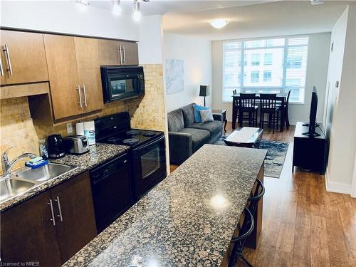 909-20 Blue Jays Way, Toronto, ON - Indoor Photo Showing Kitchen With Double Sink