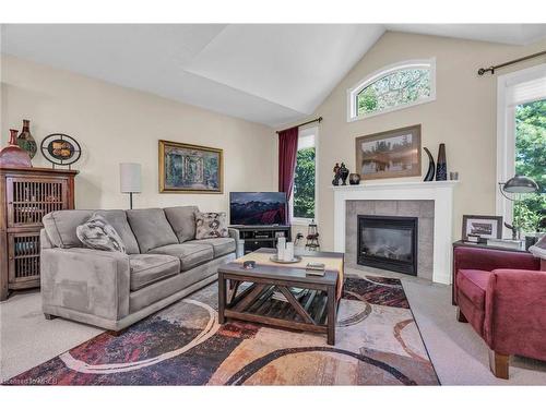 24-254 Summerfield Drive, Guelph, ON - Indoor Photo Showing Living Room With Fireplace