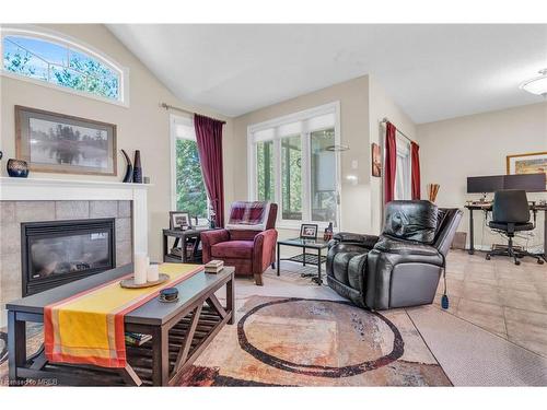 24-254 Summerfield Drive, Guelph, ON - Indoor Photo Showing Living Room With Fireplace