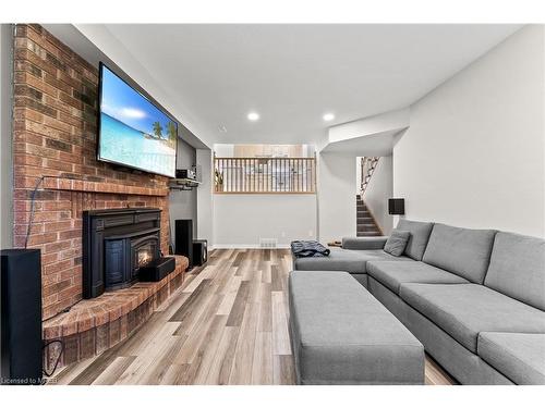 11 Daimler Drive, Kitchener, ON - Indoor Photo Showing Living Room With Fireplace