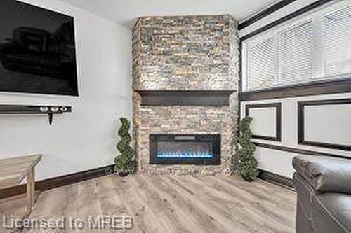 113-120 Bell Farm Road, Barrie, ON - Indoor Photo Showing Living Room With Fireplace