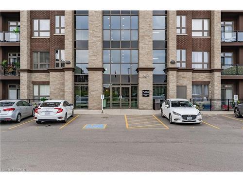 107-5020 Corporate Drive, Burlington, ON - Outdoor With Balcony With Facade