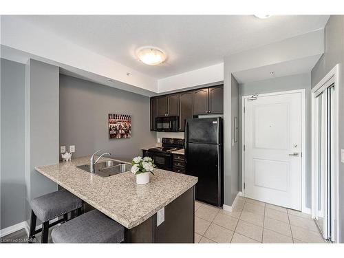 403-5020 Corporate Drive, Burlington, ON - Indoor Photo Showing Kitchen With Double Sink