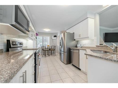 54-5662 Glen Erin Drive, Mississauga, ON - Indoor Photo Showing Kitchen With Double Sink