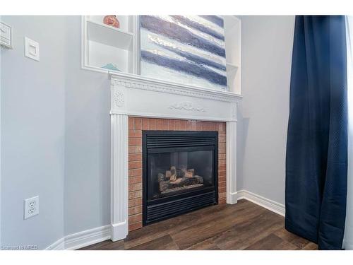 54-5662 Glen Erin Drive, Mississauga, ON - Indoor Photo Showing Living Room With Fireplace