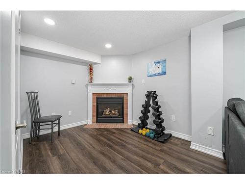 54-5662 Glen Erin Drive, Mississauga, ON - Indoor Photo Showing Other Room With Fireplace