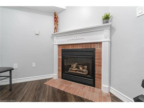 54-5662 Glen Erin Drive, Mississauga, ON - Indoor Photo Showing Living Room With Fireplace