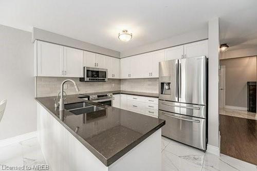 12 Hayloft Court, Brampton, ON - Indoor Photo Showing Kitchen With Double Sink With Upgraded Kitchen