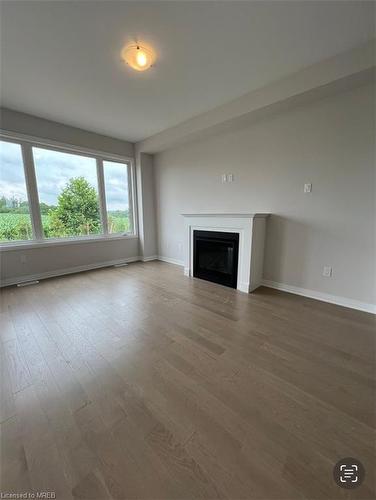 249 Leslie Davis Street, Ayr, ON - Indoor Photo Showing Living Room With Fireplace