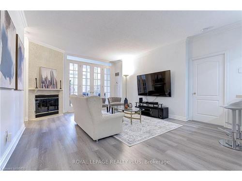 104-1 Ripley Avenue, Toronto, ON - Indoor Photo Showing Living Room With Fireplace