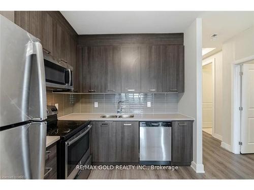 806-150 Main Street W, Hamilton, ON - Indoor Photo Showing Kitchen With Double Sink