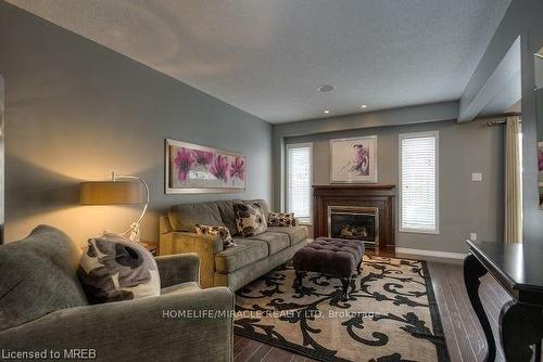 167 Sims Estate Drive, Kitchener, ON - Indoor Photo Showing Living Room With Fireplace