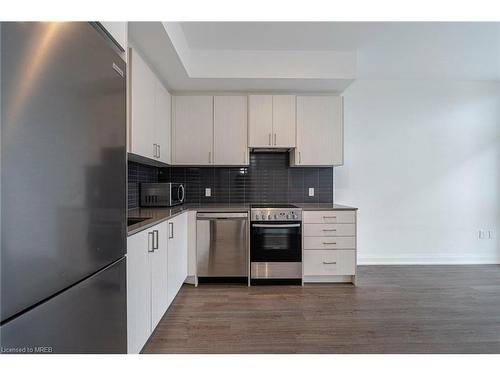 309-50 George Butchart Drive, Toronto, ON - Indoor Photo Showing Kitchen