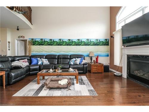 48 Allegra Drive, Wasaga Beach, ON - Indoor Photo Showing Living Room With Fireplace