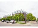 318-210 Sabina Drive, Oakville, ON  - Outdoor With Balcony With Facade 