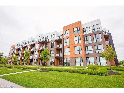 318-210 Sabina Drive, Oakville, ON - Outdoor With Balcony With Facade