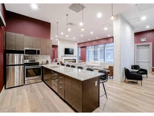 802-560 North Service Road Road, Grimsby, ON - Indoor Photo Showing Kitchen With Stainless Steel Kitchen With Double Sink With Upgraded Kitchen