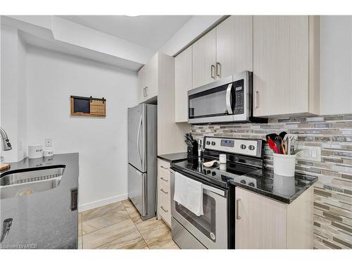 302-2486 Old Bronte Road, Oakville, ON - Indoor Photo Showing Kitchen With Stainless Steel Kitchen