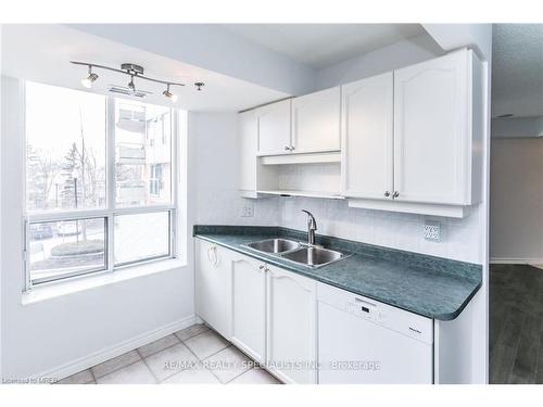 209-4640 Kimbermount Avenue, Mississauga, ON - Indoor Photo Showing Kitchen With Double Sink