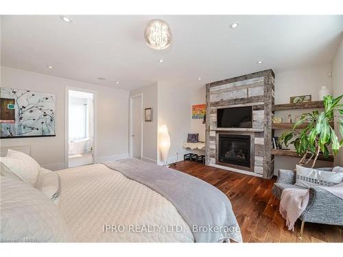 574 Stephens Crescent, Oakville, ON - Indoor Photo Showing Bedroom With Fireplace