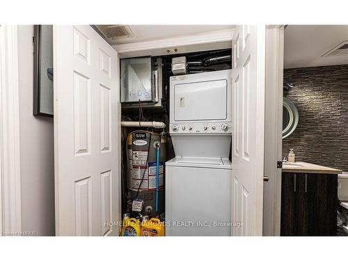 306-1450 Bishops Gate, Oakville, ON - Indoor Photo Showing Laundry Room