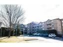 306-1450 Bishops Gate, Oakville, ON  - Outdoor With Balcony With Facade 