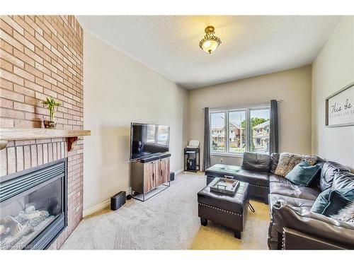 60 Pressed Brick Drive, Brampton, ON - Indoor Photo Showing Living Room With Fireplace