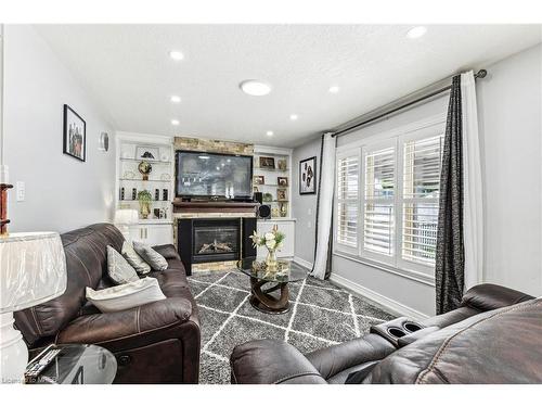 170 Southbrook Drive, Binbrook, ON - Indoor Photo Showing Living Room With Fireplace