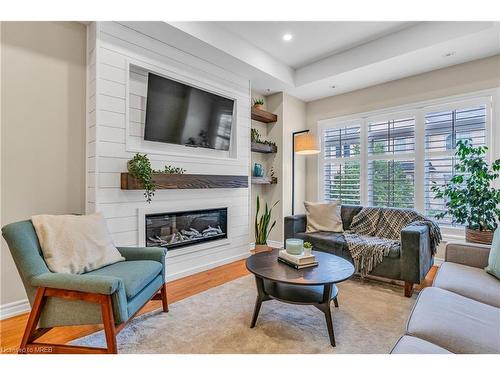 17-3038 Haines Road, Mississauga, ON - Indoor Photo Showing Living Room With Fireplace