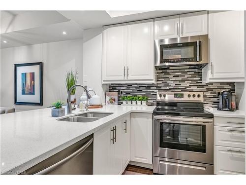 307-80 Port Street E, Mississauga, ON - Indoor Photo Showing Kitchen With Double Sink With Upgraded Kitchen