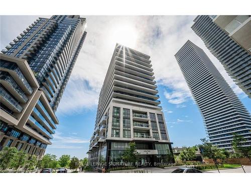 209-65 Annie Craig Drive, Toronto, ON - Outdoor With Balcony With Facade