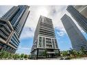 209-65 Annie Craig Drive, Toronto, ON  - Outdoor With Balcony With Facade 