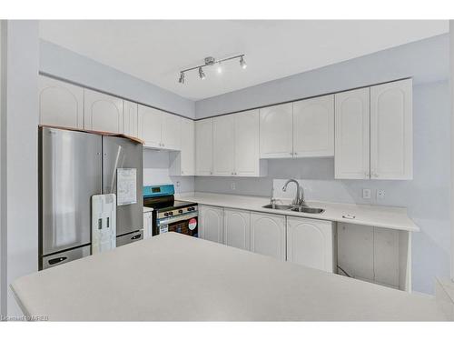 38 Gristone Crescent, Toronto, ON - Indoor Photo Showing Kitchen With Double Sink