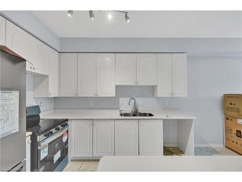 38 Gristone Crescent, Toronto, ON - Indoor Photo Showing Kitchen With Double Sink