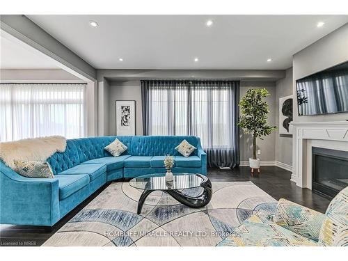 24 Toffee Trail, Hamilton, ON - Indoor Photo Showing Living Room With Fireplace