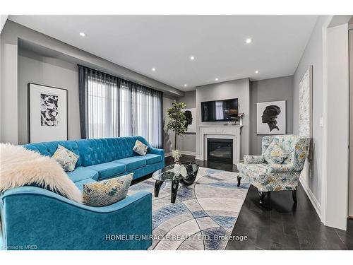 24 Toffee Trail, Hamilton, ON - Indoor Photo Showing Living Room With Fireplace