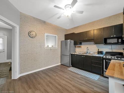 1083 Cannon Street E, Hamilton, ON - Indoor Photo Showing Kitchen With Double Sink