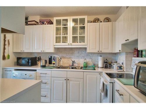 602-3625 Lake Shore Road W, Etobicoke, ON - Indoor Photo Showing Kitchen With Double Sink